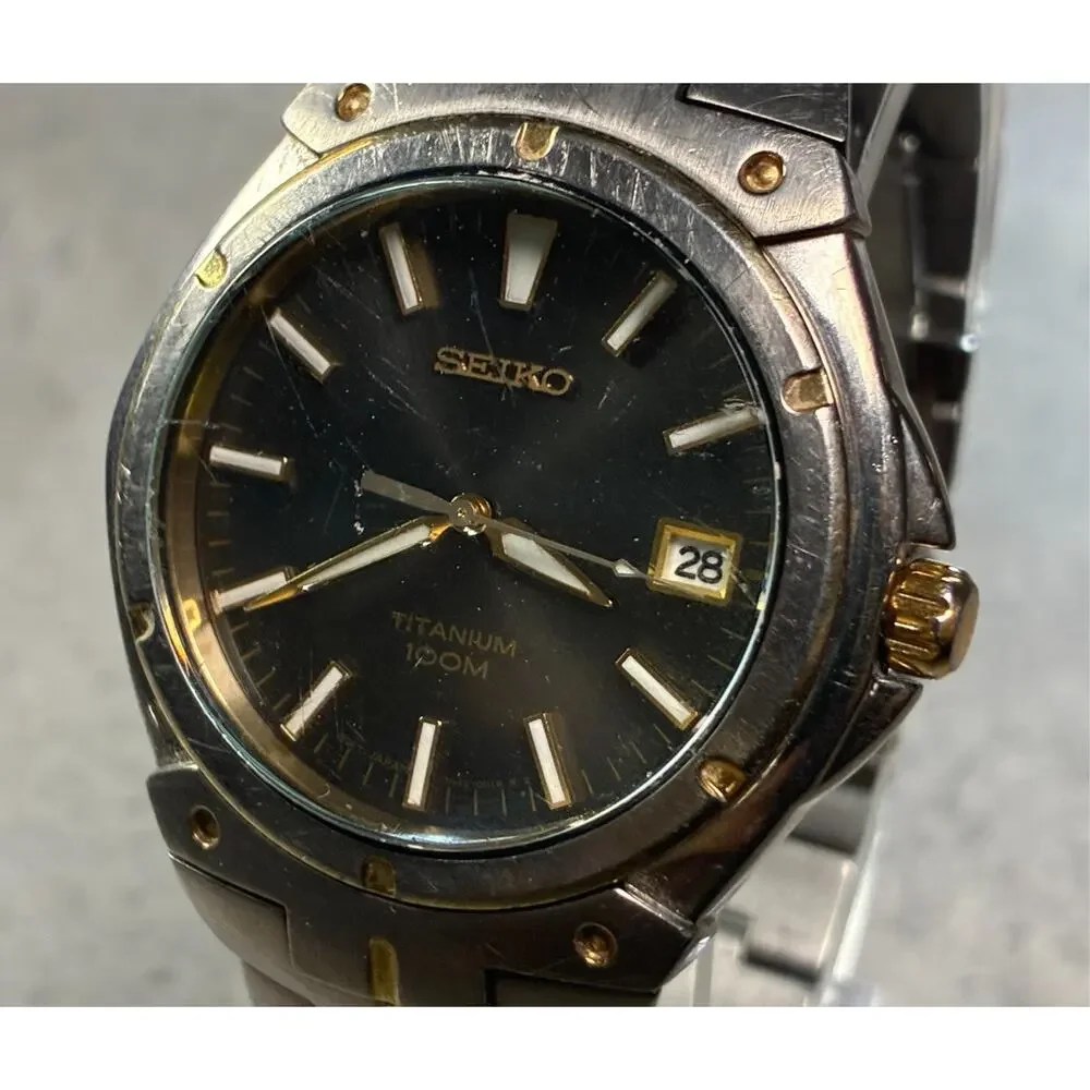Seiko Titanium Men's Watch 7N42‑0CA0 100M Black Sunburst Dial Date Japan Working